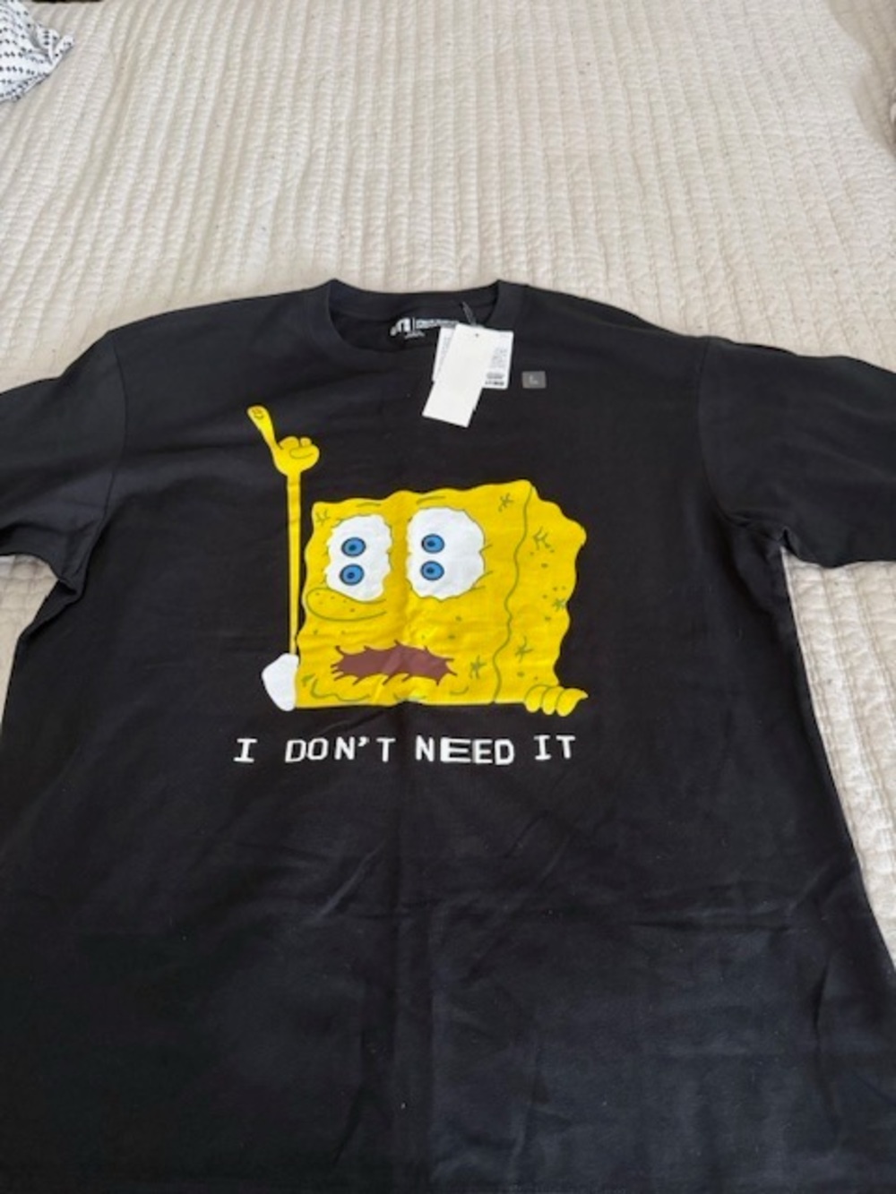 Cactus Plant Flea Market Black Tee with Yellow Sponge Graphic and White Text